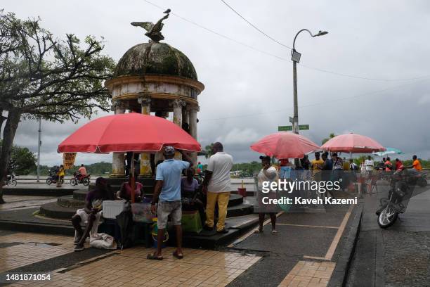 Street sellers around a monument in the city center in memory of Cesar Conto who was a Colombian lawyer, politician and poet on 16 January 2023 in...