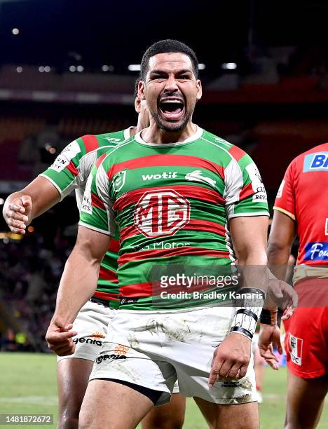 Cody Walker of the Rabbitohs celebrates scoring a try during the round seven NRL match between the Dolphins and South Sydney Rabbitohs at Suncorp...