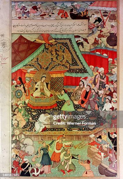 16th century illustration for a 14th century Persian story 'The History of the Mongols', King Oghuz holds a feast in the gold tent to celebrate the...