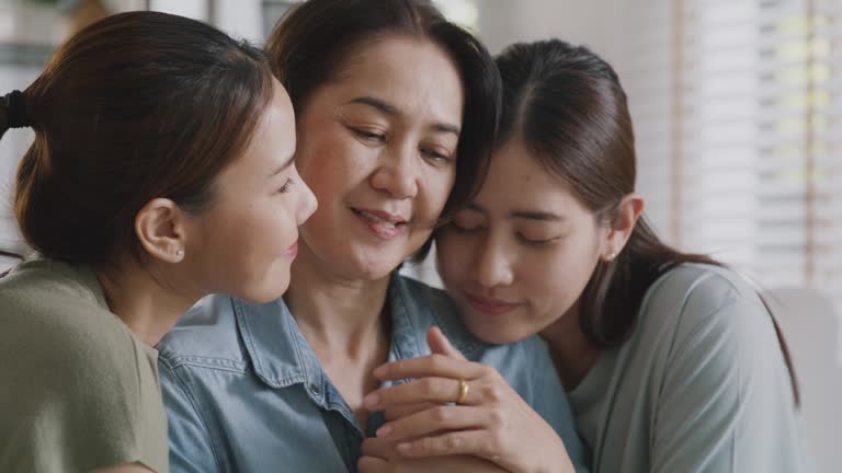 https://media.gettyimages.com/id/1481905751/video/group-of-female-family-young-adult-child-cuddle-hug-sad-mom-with-love.jpg?b=1&s=640x640&k=20&c=vDtzRdKwYl3y937DoUi6i0uVnzeEXHR1Dr9TktSxvH8=