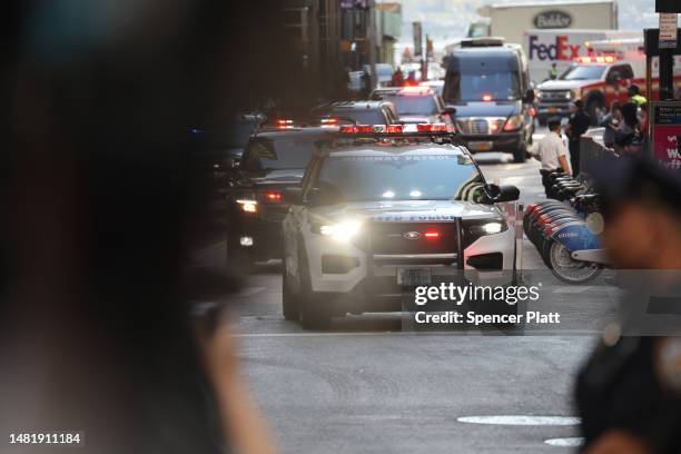 Former president Donald Trump's motorcade arrives at the offices of New York’s Attorney General for his scheduled second deposition in a legal battle...
