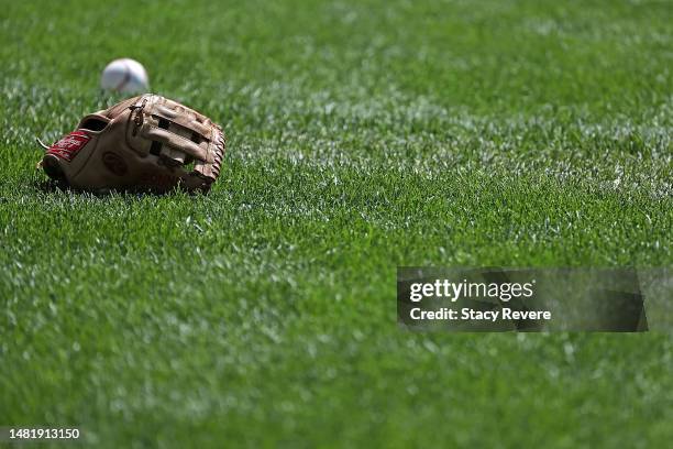 Detailed view of a baseball and glove at American Family Field prior to a game between the Milwaukee Brewers and the St. Louis Cardinals on April 09,...