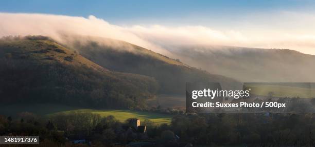 newtimber hill south downs sunset clouuds,pyecombe,brighton,united kingdom,uk - south downs national park stock pictures, royalty-free photos & images