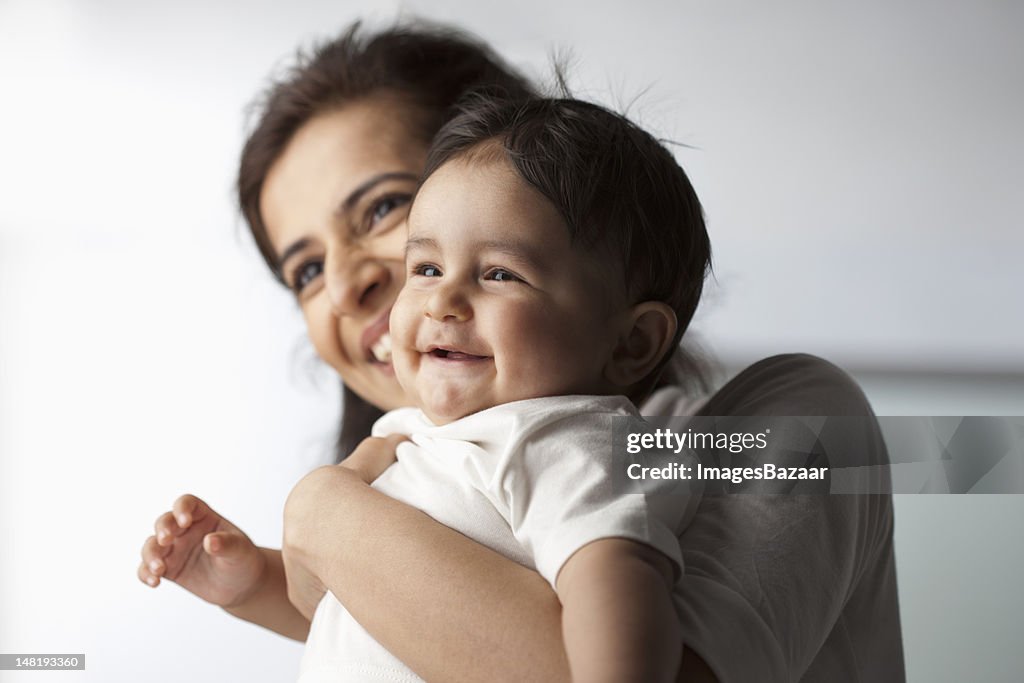 Mother with baby son (12-17 months)