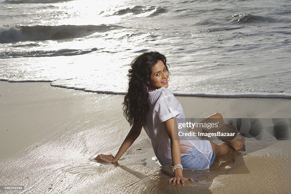 Portrait of beautiful young woman on beach