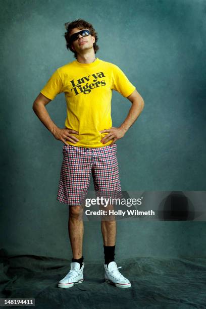 nerdy caucasian man with hands on hips - nerd stock pictures, royalty-free photos & images
