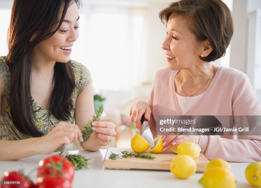 Japanese mother and daughter cooking together