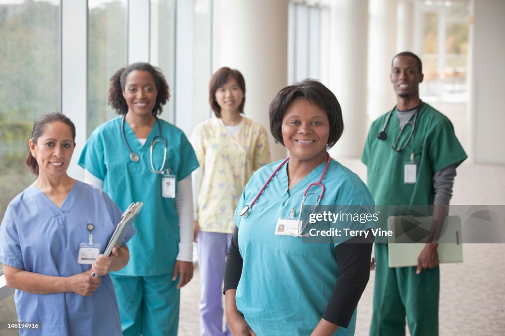 Doctors and nurses standing in hospital