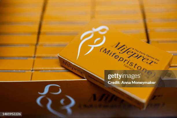 In this photo illustration, packages of Mifepristone tablets are displayed at a family planning clinic on April 13, 2023 in Rockville, Maryland. A...