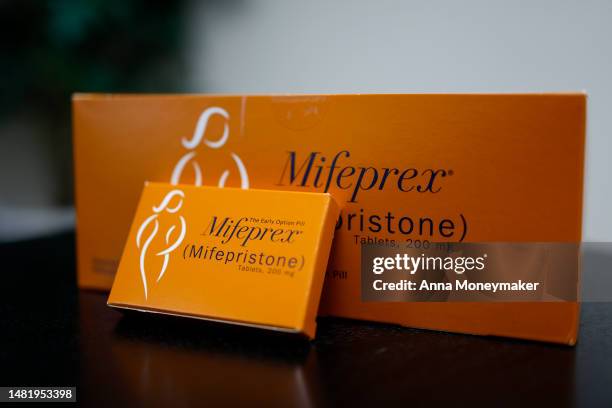 In this photo illustration, packages of Mifepristone tablets are displayed at a family planning clinic on April 13, 2023 in Rockville, Maryland. A...