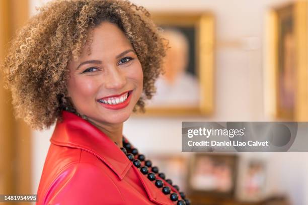 portrait of a beautiful 36 year old happy woman looking at the camera. - 39 year old stock-fotos und bilder