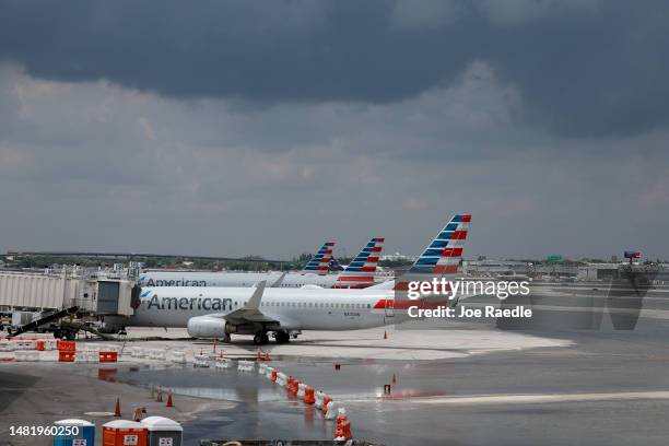 Planes sit at their gates after the Fort Lauderdale-Hollywood International Airport was closed due to the runways being flooded on April 13, 2023 in...