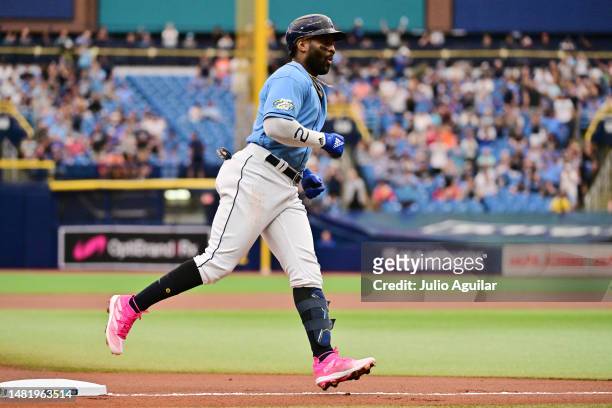 Yandy Diaz of the Tampa Bay Rays rounds third base after hitting a home run in the first inning against the Boston Red Sox at Tropicana Field on...