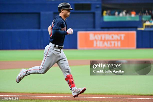 Rob Refsnyder of the Boston Red Sox runs the bases after hitting a home run in the first inning against the Tampa Bay Rays at Tropicana Field on...