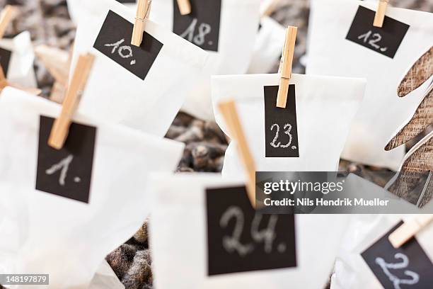 close up of numbered bags - advent stock-fotos und bilder