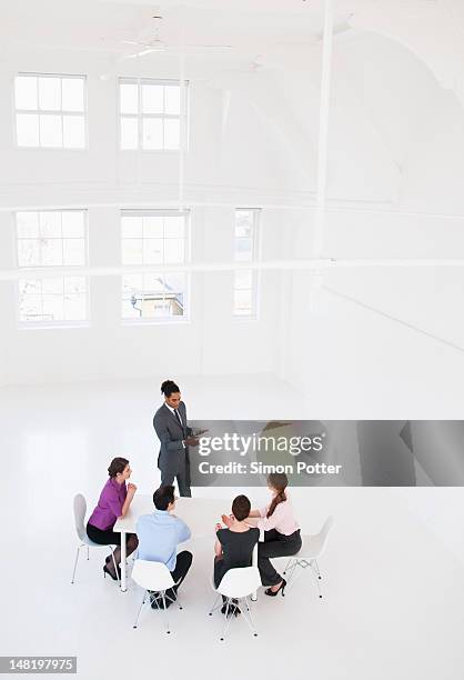 businessman giving presentation - business meeting copy space stock pictures, royalty-free photos & images