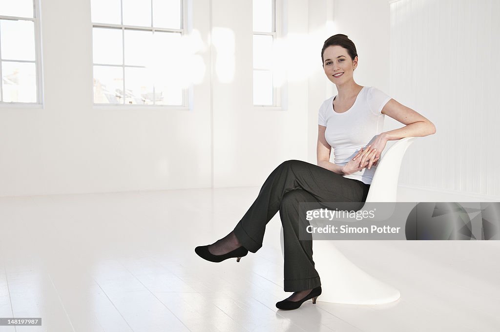 Businesswoman sitting in lobby area