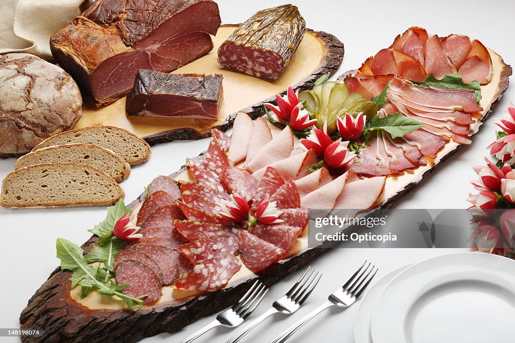 Close up of platter of meat and bread