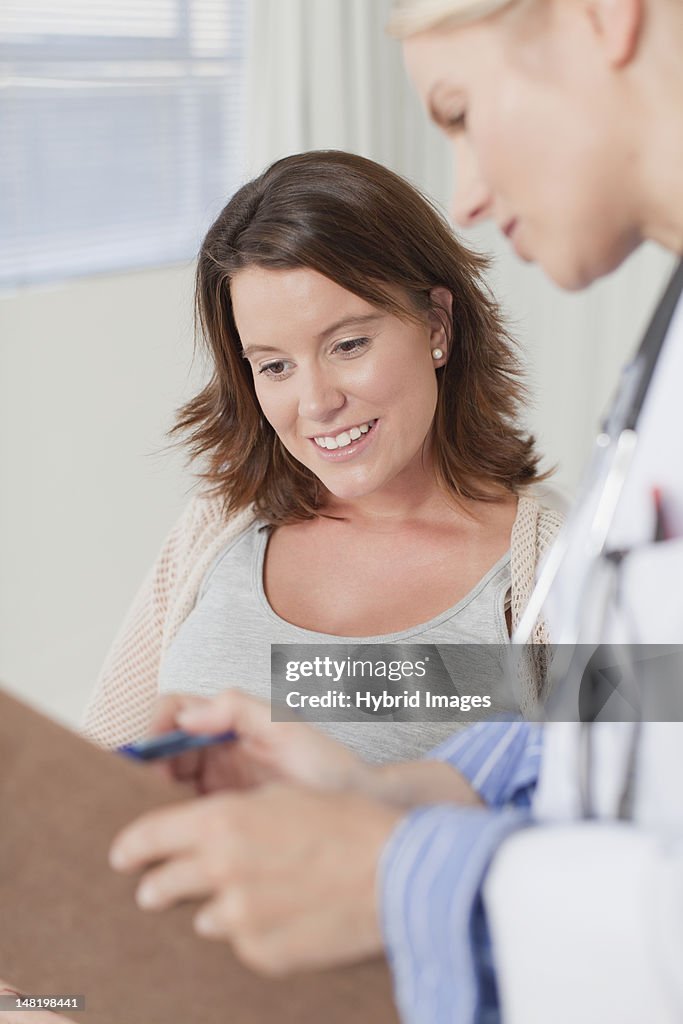 Doctor and patient talking in office