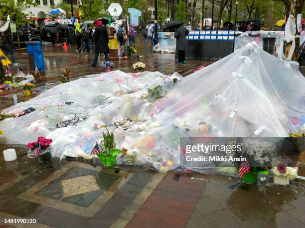 View of a plastic-covered memorial to victims of the Boston Marathon Bombing , Copley Square, Boston, Massachusetts, May 9, 2013.