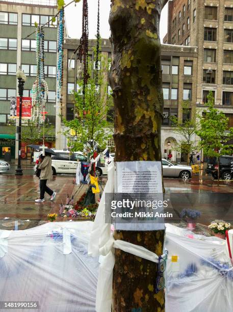 Close-up of a plastic-covered message at a memorial for the victims of the Boston Marathon Bombing , Copley Square, Boston, Massachusetts, May 9,...