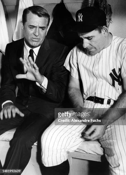 Actor Cary Grant meets Yogi Berra at Los Yankees Stadium in 1961, New York.