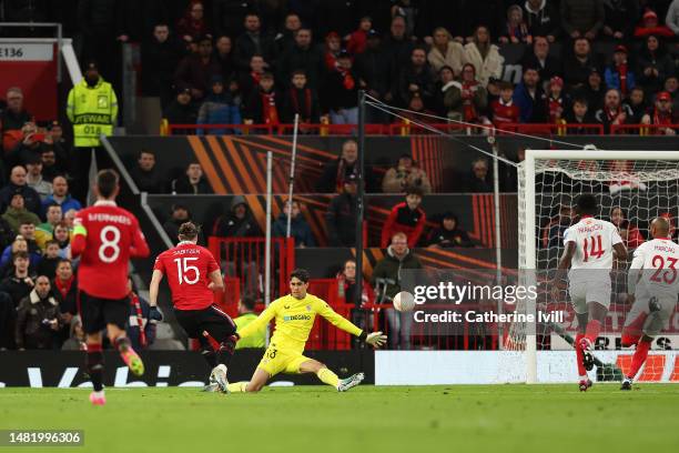 Marcel Sabitzer of Manchester United scores the team's second goal past Yassine Bounou of Sevilla FC during the UEFA Europa League quarterfinal first...