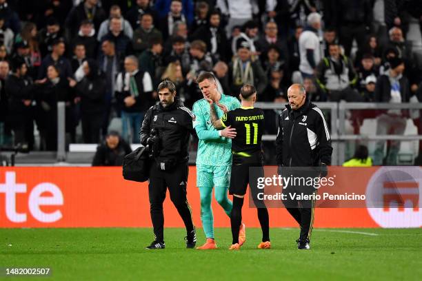 Wojciech Szczesny of Juventus is substituted after sustaining an injury during the UEFA Europa League quarterfinal first leg match between Juventus...