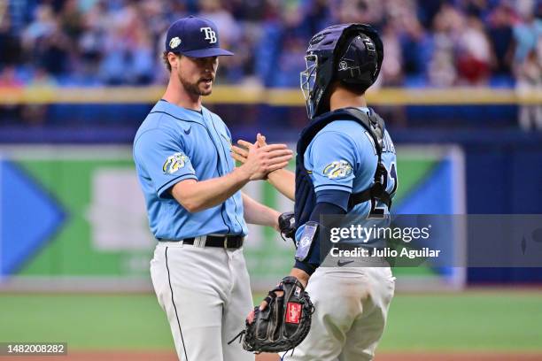 Braden Bristo and Francisco Mejia of the Tampa Bay Rays celebrate after defeating the Boston Red Sox 9-3 at Tropicana Field on April 13, 2023 in St...