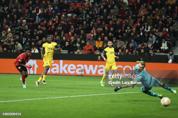 Victor Boniface of Royale Union Saint-Gilloise scores the team's first goal past Lukas Hradecky of Bayer 04 Leverkusen during the UEFA Europa League...