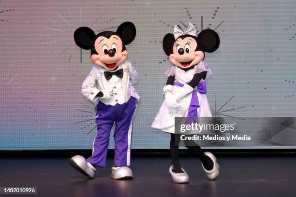 Actors dressed as Walt Disney characters Mickey Mouse and Minnie Mouse attend the press conference on the 'Disney 100 En Concierto' at Lunario del...