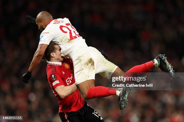 Marcao of Sevilla FC collides with Marcel Sabitzer of Manchester United during the UEFA Europa League quarterfinal first leg match between Manchester...