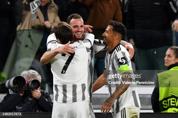 Federico Gatti of Juventus celebrates with teammates Federico Chiesa and Danilo after scoring the team's first goal during the UEFA Europa League...