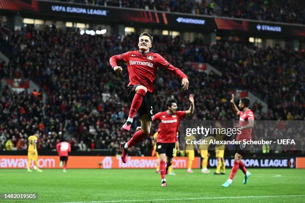 Florian Wirtz of Bayer 04 Leverkusen celebrates after scoring the team's first goal during the UEFA Europa League quarterfinal first leg match...