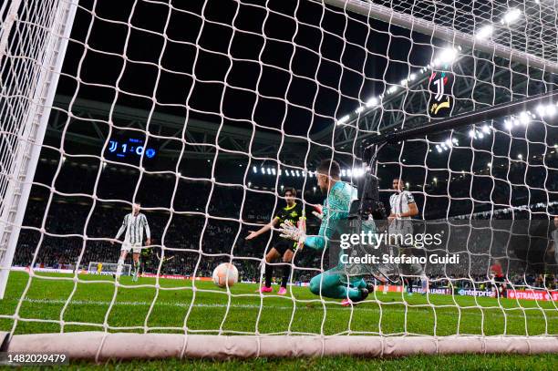 Mattia Perin of Juventus FC makes a save against Pedro Gonçalves of Sporting CP during the UEFA Europa League quarterfinal first leg match between...