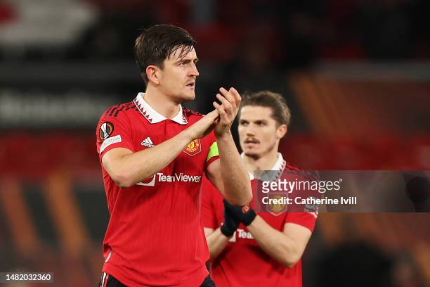 Harry Maguire of Manchester United applauds the fans after the draw in the UEFA Europa League quarterfinal first leg match between Manchester United...