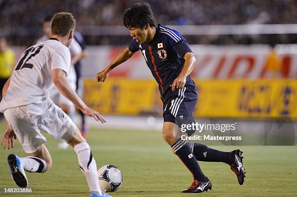 Kensuke Nagai of Japan in action during the international friendly match between Japan U-23 and New Zealand U-23 at the National Stadium on July 11,...