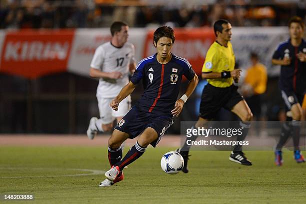 Kenyu Sugimoto of Japan in action during the international friendly match between Japan U-23 and New Zealand U-23 at the National Stadium on July 11,...