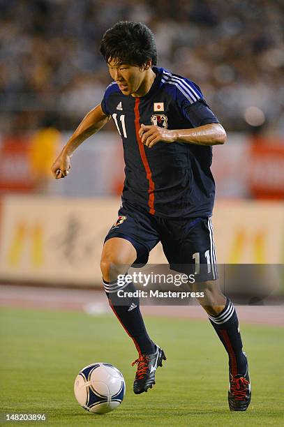 Kensuke Nagai of Japan in action during the international friendly match between Japan U-23 and New Zealand U-23 at the National Stadium on July 11,...