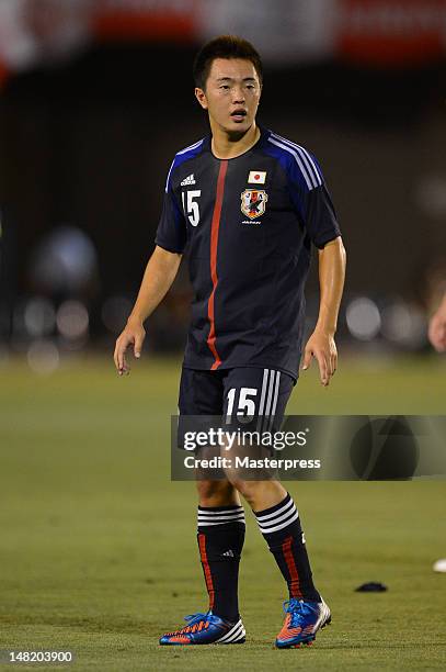 Manabu Saito of Japan in action during the international friendly match between Japan U-23 and New Zealand U-23 at the National Stadium on July 11,...