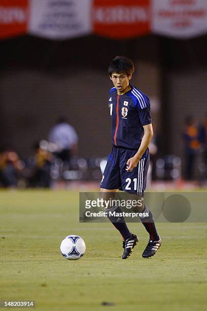 Takuji Yonemoto of Japan in action during the international friendly match between Japan U-23 and New Zealand U-23 at the National Stadium on July...