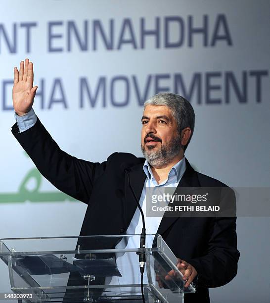 Khaled Meshaal,political chief of the Palestinian Islamist movement Hamas which rules the Gaza Strip waves at the congress of the Tunisia's ruling...