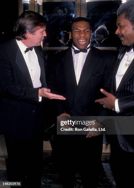 Donald Trump, Mike Tyson and Don King attend March of Dimes Gourmet Gala on November 21, 1989 at the Plaza Hotel in New York City.