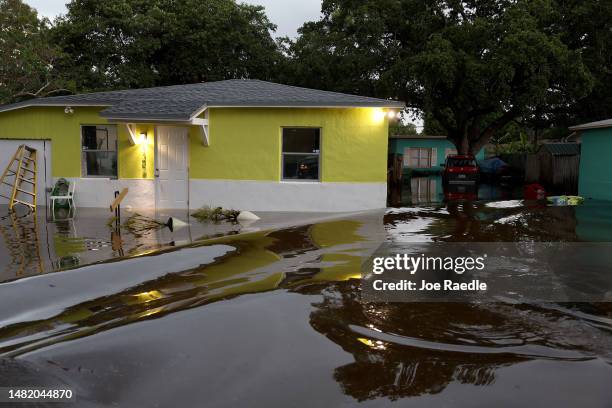 Flood waters surround a home on April 13, 2023 in Fort Lauderdale, Florida. Nearly 26 inches of rain fell on Fort Lauderdale over a 24-hour period,...