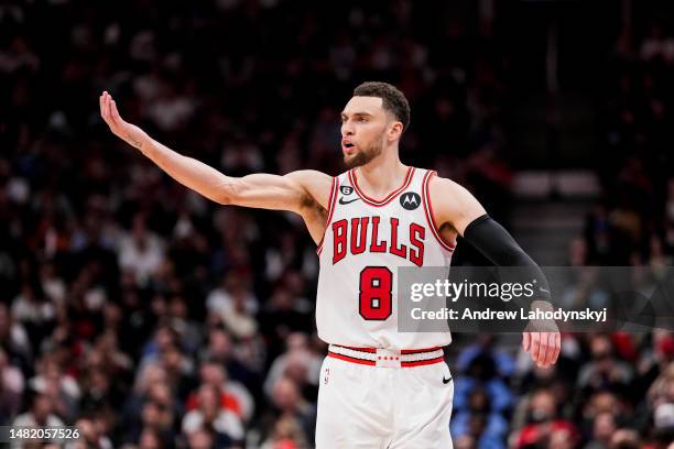 Zach LaVine of the Chicago Bulls gestures against the Toronto Raptors during the 2023 Play-In Tournament at the Scotiabank Arena on April 12, 2023 in...
