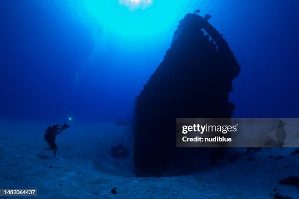 remnants of war - deep sea diving stock pictures, royalty-free photos & images