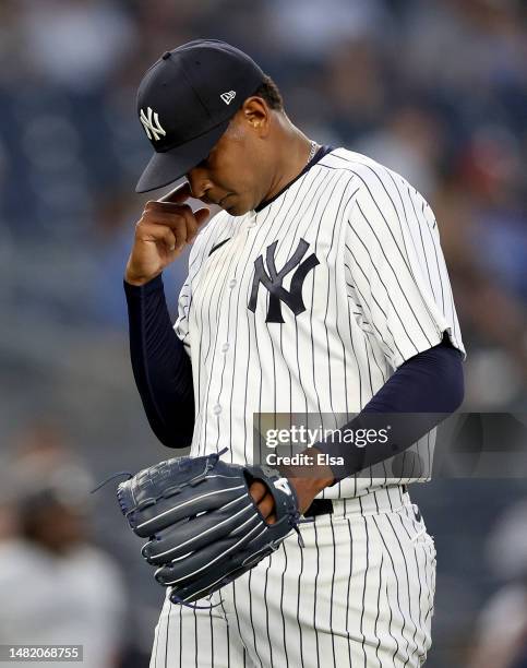 Jhony Brito of the New York Yankees reacts after he is pulled in the first inning against the Minnesota Twins at Yankee Stadium on April 13, 2023 in...