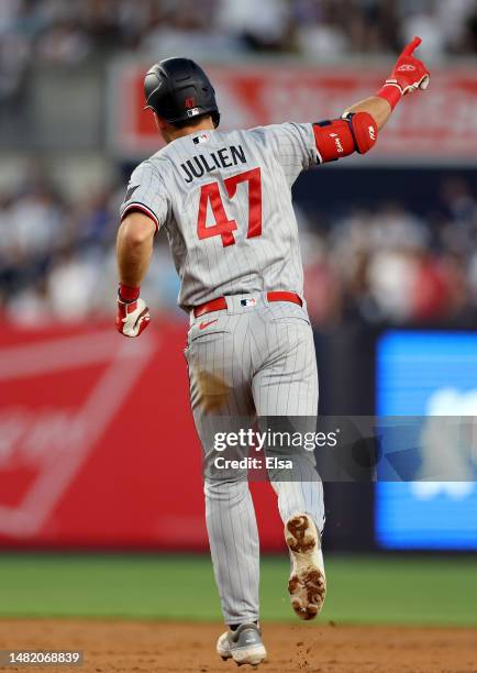 Edouard Julien of the Minnesota Twins celebrates his solo homer run in the first inning against the New York Yankees at Yankee Stadium on April 13,...