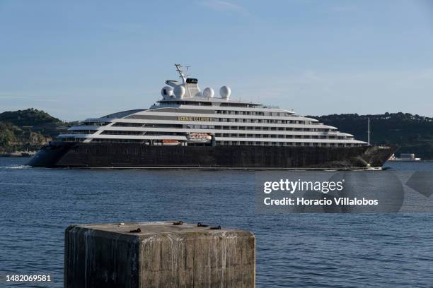 Scenic Eclipse II, a 6-star ultra-luxury Discovery Yacht, sails the Tagus River after leaving the city's cruise terminal on her inaugural 11-day...