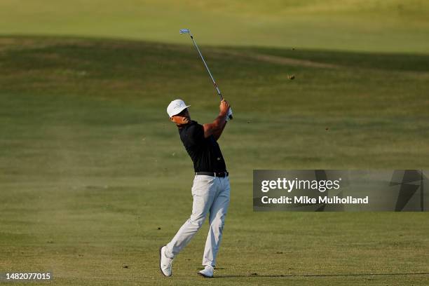 Bryson Nimmer of the United States hits an approach shot on the 17th hole during the first round of the Veritex Bank Championship at Texas Rangers...